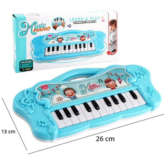 Piano pour bébé bleu mesurant 26 cm sur 13 cm avec 14 touches noires et blanches, conçu pour l'éveil musical des touts-petits.