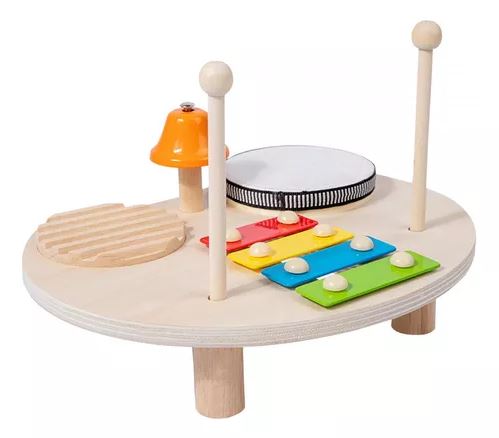 Table musicale Montessori en bois avec xylophone coloré, tambour et cloche, idéale pour l'éveil musical des jeunes enfants.