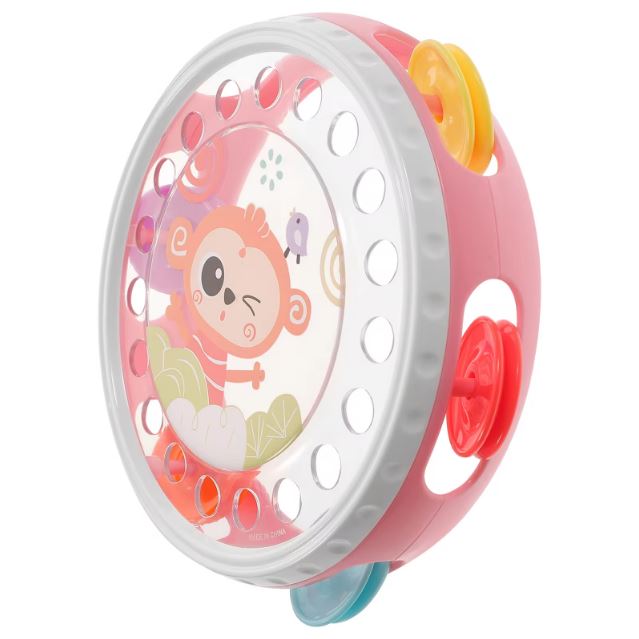 Tambourin pour enfant rose avec un motif de singe et des grelots colorés, idéal pour initier les enfants de premier âge à la musique et au rythme.